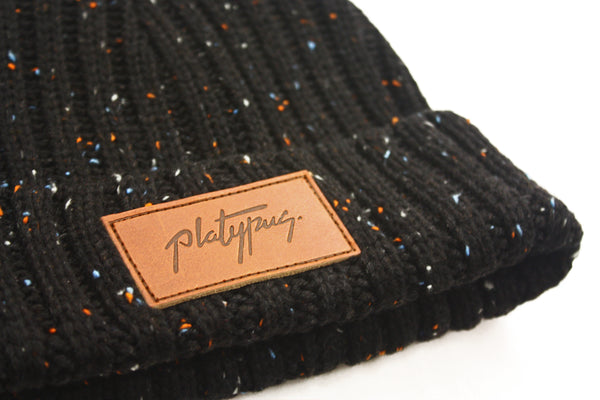 Platypus Leather patch close up on Black Speckle Knit Street Style Beanie Hat