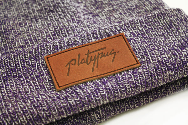 Close up of leather patch on antique purple Knit Beanie hat | Platypus streetwear clothing with Free UK shipping