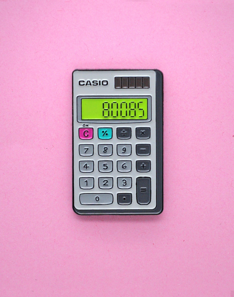 Boobs Calculator (Glow in the Dark) Enamel Pin