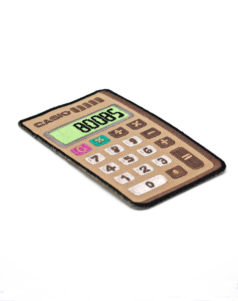 Boobs Casio Calculator (Glow in the Dark) Iron-on Retro Patch by Maxine Abbott | Best Streetwear Patches & Pins UK