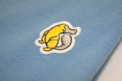 Emblem Close up on Rainbow Tipped Blue Platypus Emblem Polo Shirt 
