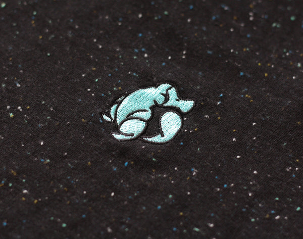 Close up of classic Platypus embroidered emblem on Fleck Tee