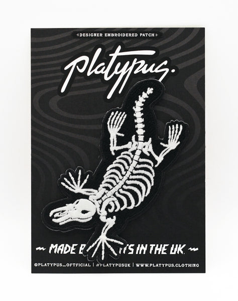 Glow in the dark embroidered platypus skeleton iron-on patch Platypus UK Packaging Nottingham brand