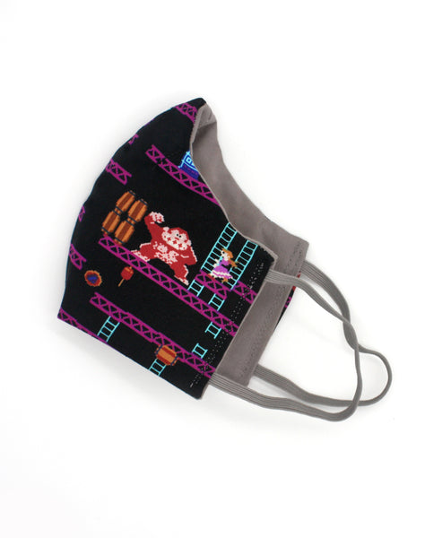 Side view of cool mario dk print uk cotton face mask