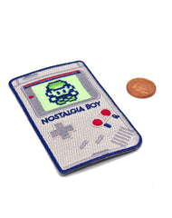 Close up of Glow in the dark Nostalgia boy game boy parody designer Iron-on Embroidered Patches to scale made in UK