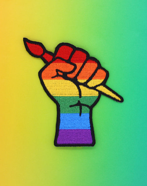 Queer art protest punk raised fist lgbtq gay rainbow pride iron-on patch badge Platypus UK