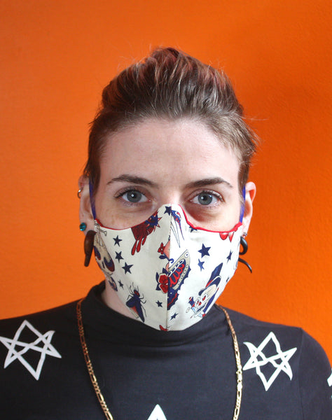 Model in unisex tattoo pattern fitted face mask
