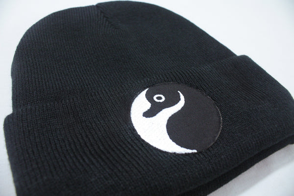 Close up of Platypus Ying Yang Wooven Patch Beanie Hat